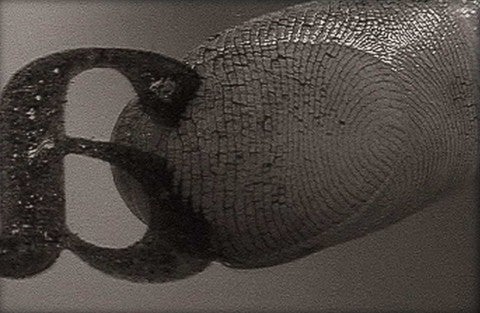 Ann Hamilton, (abc • video), 1994/1999 A fingerprint on a backward cutout of the letter A