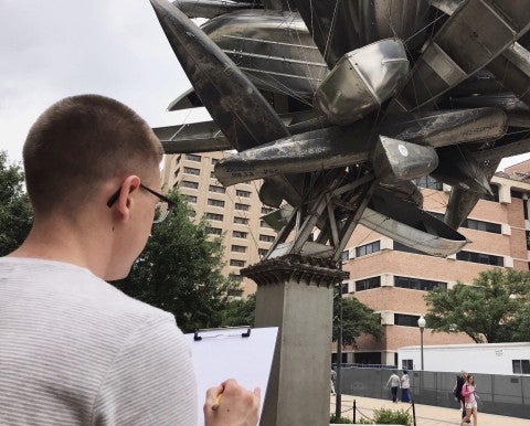 man drawing sculpture man drawing sculpture