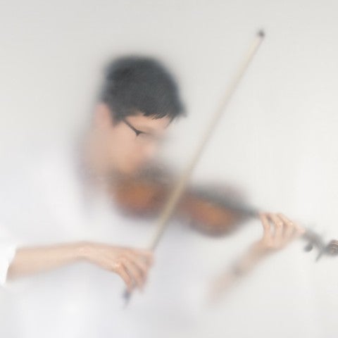A man playing the violin