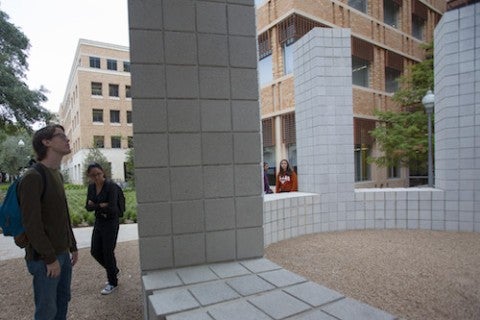 Students in front of Sculpture