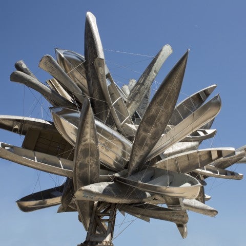 Nancy Rubins "Monochrome of Austin" which consists of 70 canoes suspended in the air.