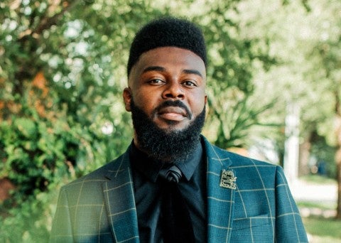 A headshot of vocalist Joseph Reese 